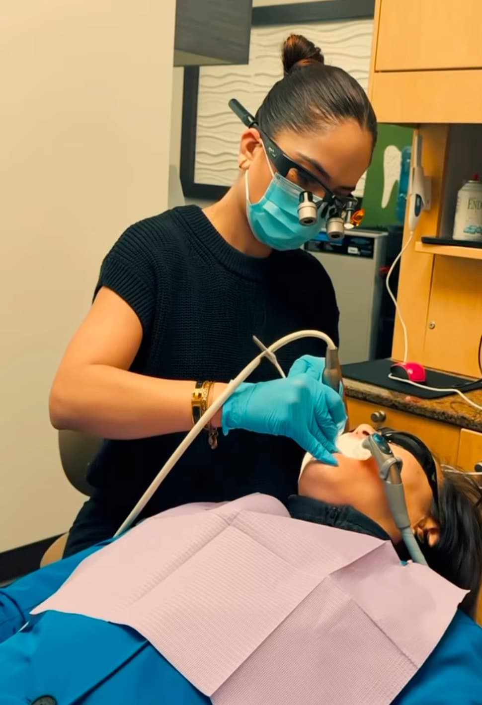 Dr. Sheena Gaur working on a patient